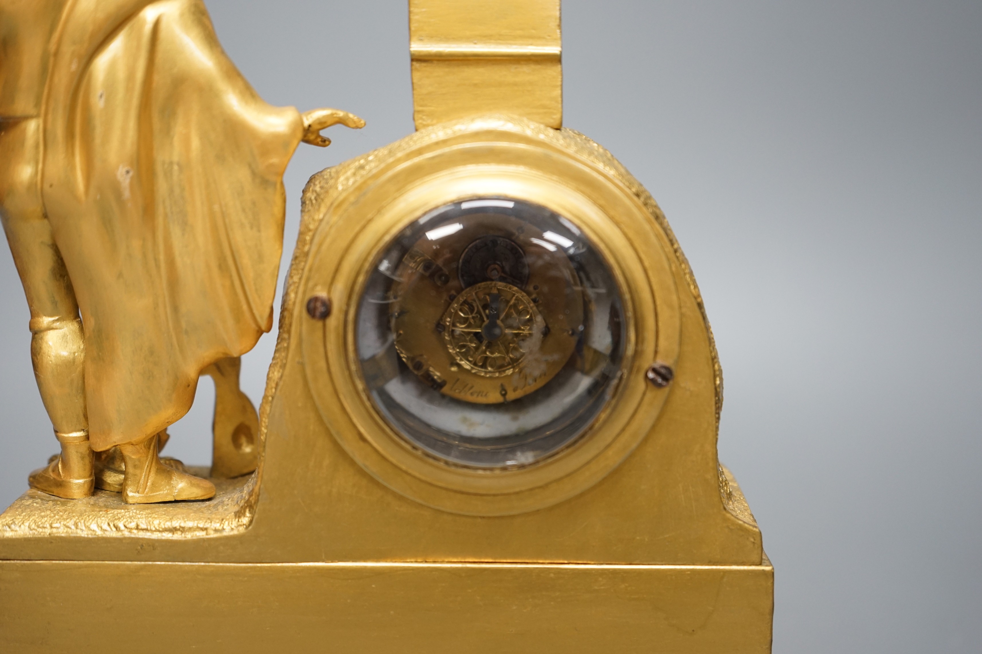 A 19th century ormolu clock with 'Huntsman' figure, 25cm tall